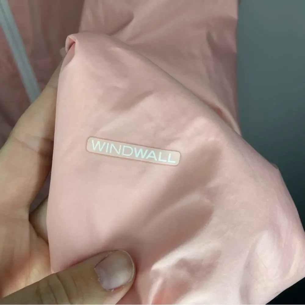 The North Face Girls' Never Stop Hooded Windwall Jacket in Pink Moss Size L